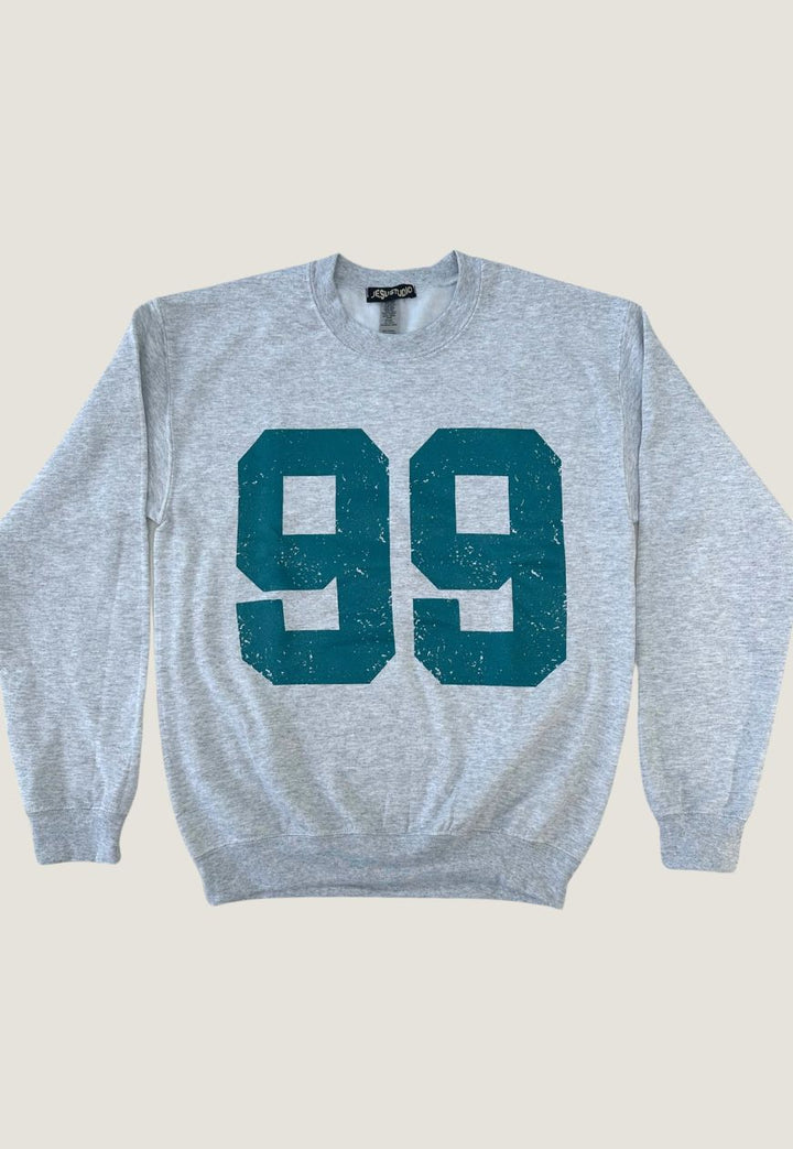 "THE 99" SWEATER